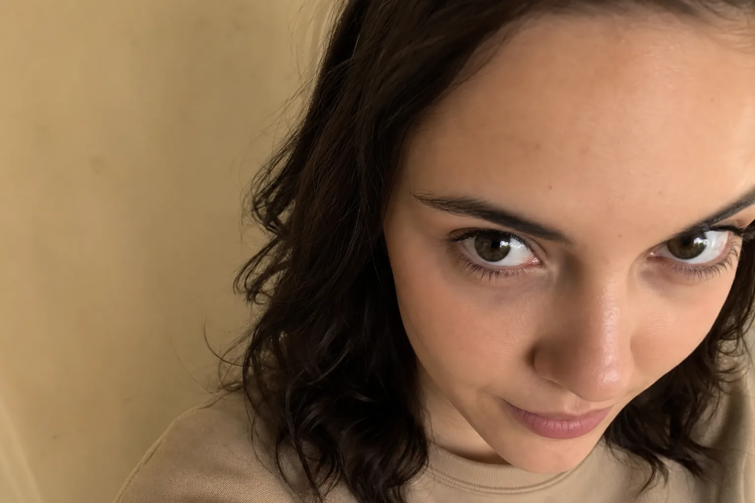 Portrait taken from an extreme high angle with the face tightly cropped